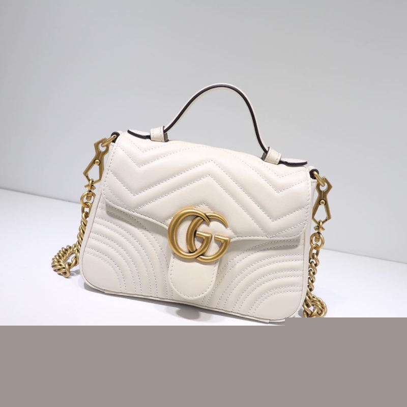 G*u*i top handle bags